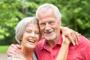 Old couple smiling together