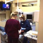 Dentist checking a patient