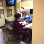 Dentist checking a patient