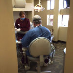 Dentist checking a patient