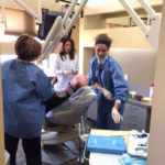 Dentist checking a patient